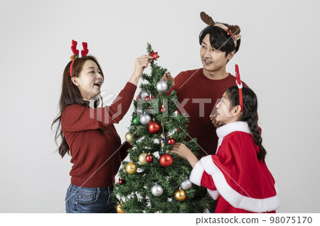 happy Asian Korean family in Christmas concept_decorating the christmas tree 98075170