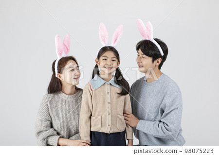happy Asian Korean family, isolated in white background_wearing rabbit hairband 98075223
