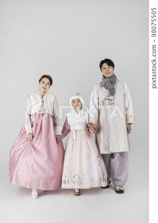 Korean family in Hanbok, isolated white background_standing friendly Korean family in Hanbok, isolated white background_standing friendly 98075505