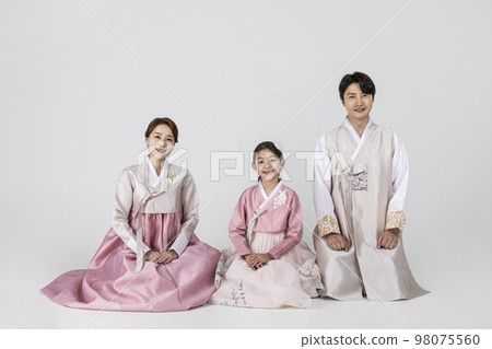 Korean family in Hanbok, isolated white background_sitting side by side Korean family in Hanbok, isolated white background_sitting side by side 98075560