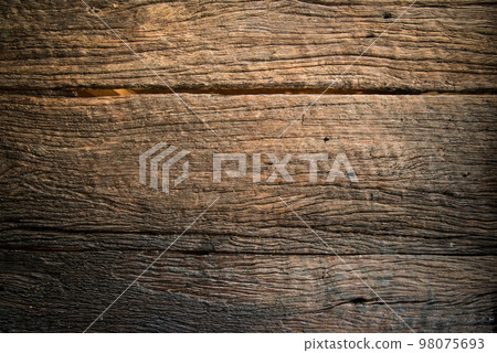 The closeup of wooden table and the texture on the surface. The closeup of wooden table and the texture on the surface. 98075693