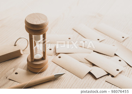 Word book and hourglass image material for exam study 98076455