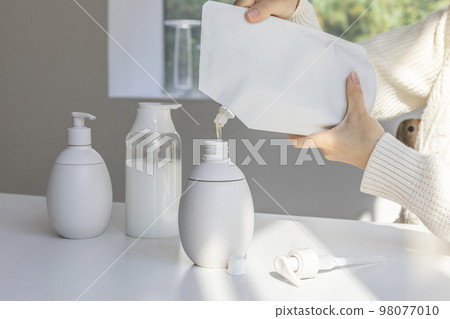 eco friendly habits hand gesture_using refill containers eco friendly habits hand gesture_using refill containers 98077010