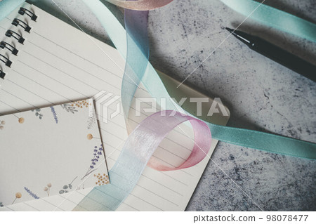 notebook, pen and ribbon notebook, pen and ribbon 98078477