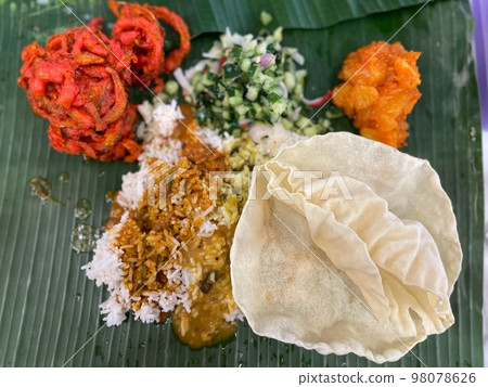 Malaysian banana leaf curry 98078626