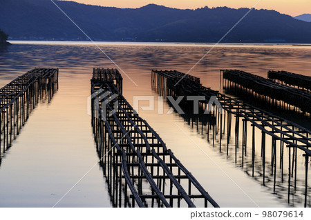 Setouchi sunrise with oyster shelves Setouchi sunrise with oyster shelves 98079614