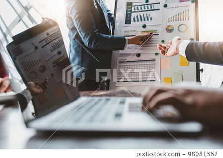 Close up Business team of financial analyze about company's graph profit. finance, strategy, meeting concept Close up Business team of financial analyze about company's graph profit. finance, strategy, meeting concept 98081362
