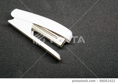 White stapler (black background) White stapler (black background) 98081422