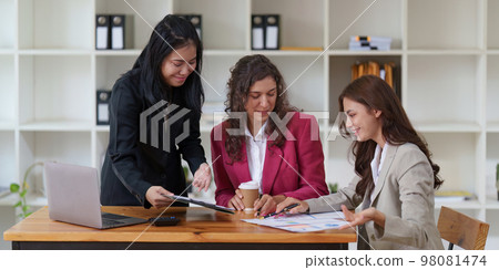 Business People Meeting to discuss and brainstorming the financial report paperwork in home office. Financial advisor teamwork and accounting concept Business People Meeting to discuss and brainstorming the financial report paperwork in home office. Financial advisor teamwork and accounting concept 98081474