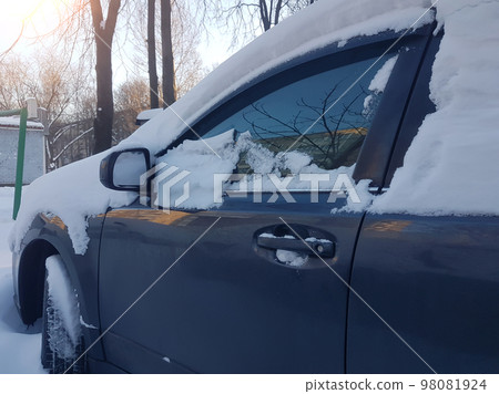 close up.cars under the snow in the Parking lot 98081924