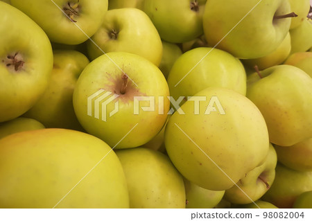 fresh green apples on the counter in the supermarket fresh green apples on the counter in the supermarket 98082004