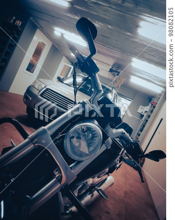 close up. car and motorcycle in the home workshop. close up. car and motorcycle in the home workshop. 98082105