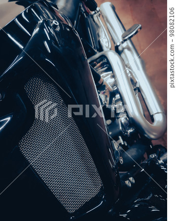 close up. motorcycle in the home workshop close up. motorcycle in the home workshop 98082106