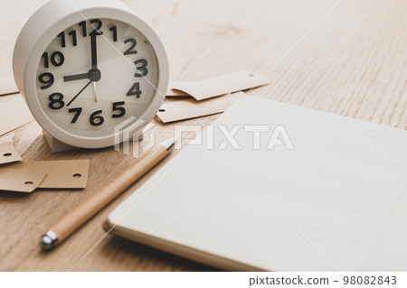 Notebook and clock study image material 98082843