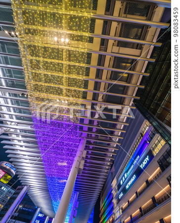 Yokohama cityscape in Japan Illumination of the large roof of the central west exit square of Yokohama Station. Changes in various colors = January 9 Yokohama cityscape in Japan Illumination of the large roof of the central west exit square of Yokohama Station. Changes in various colors = January 9 98083459