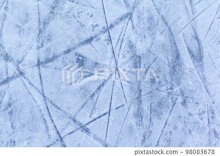 Empty ice rink with skate marks after the session outdoor. 98083678