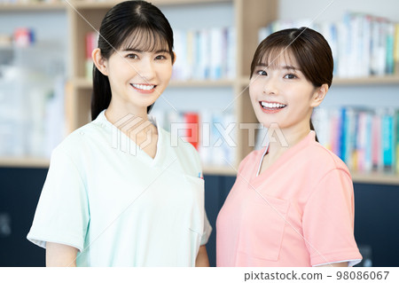 two nurse women two nurse women 98086067