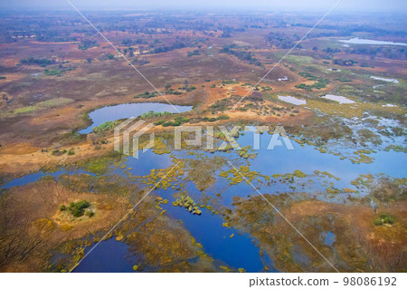 Aerial view, Okavango Wetlands, Okavango Delta, Botswana Aerial view, Okavango Wetlands, Okavango Delta, Botswana 98086192