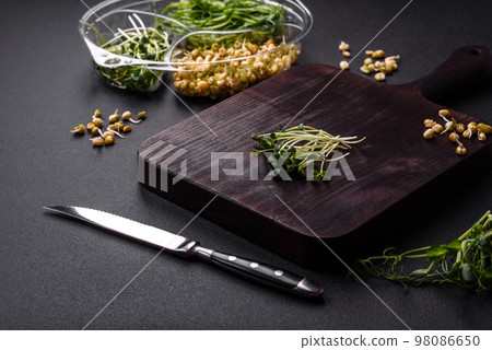 A set or mix of pea, mustard and sprouted mung bean microgreens 98086650