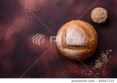 Beautiful delicious freshly baked round shaped white bread 98087235