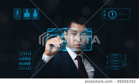 Businessman action Plan strategy with digital future technology Virtual Holographic interface. Businessman action Plan strategy with digital future technology Virtual Holographic interface. 98088392