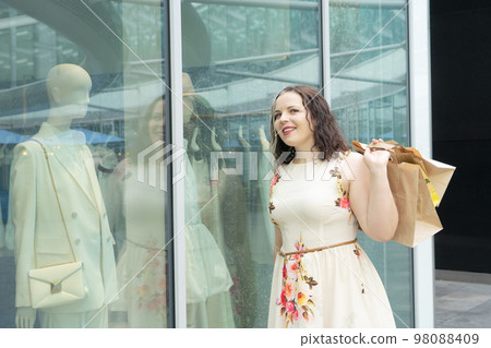 Happy woman shopping Happy woman shopping 98088409