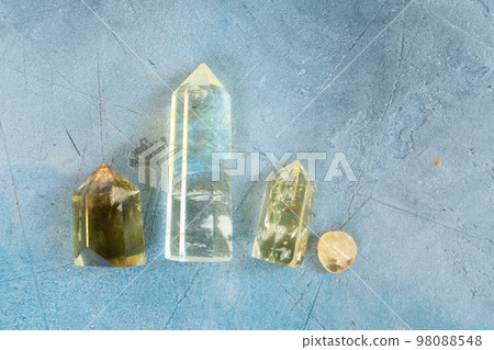 Healing crystals on brown background Healing crystals on brown background 98088548