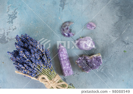 Healing crystals on brown background 98088549