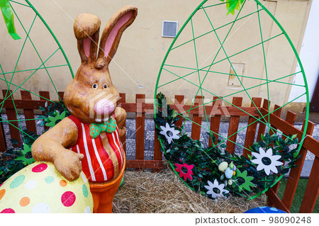 Festive sculpture of the Easter bunny Festive sculpture of the Easter bunny 98090248