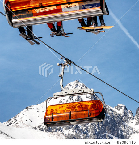 Ski lift and peak Lomnicky stit in High Tatras mountains in resort Tatranska Lomnica, Slovakia 98090419