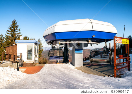 Top station of ski-lift chair at Salamandra resort in winter season, Slovakia 98090447