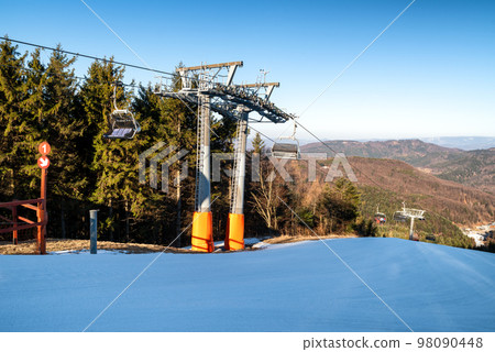 Chairs at ski-lift chair at Salamandra resort in winter season. 98090448
