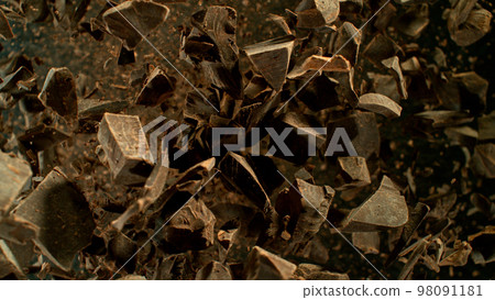 Freeze Motion Shot of Exploding Chocolate Chunks, Macro. Freeze Motion Shot of Exploding Chocolate Chunks, Macro. 98091181