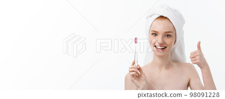 Portrait of young woman with toothbrush on grey background. Portrait of young woman with toothbrush on grey background. 98091228