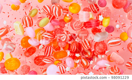 Sweet candies flying, freeze motion Sweet candies flying, freeze motion 98091229