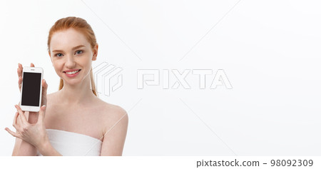 portrait of beautiful girl with phone conversation. Isolated on light white background 98092309