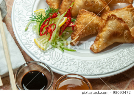 Fried dumplings wontons. Fried dumplings wontons. 98093472