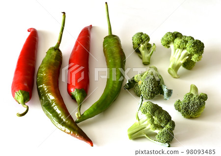 Autumn harvest, red and green hot peppers, cauliflower. Autumn harvest, red and green hot peppers, cauliflower. 98093485