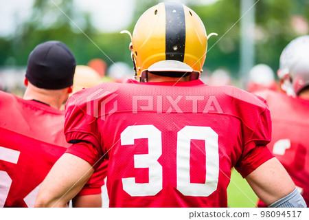 American football players in action 98094517