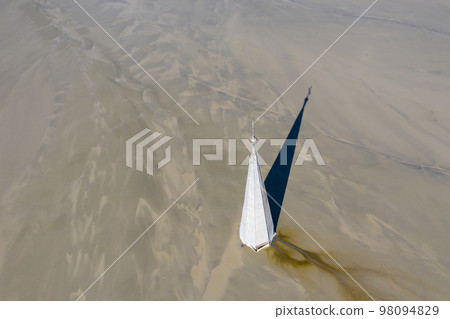 Aerial view church and village flooded by heavy metal residuals from a copper mine. Apocalyptic scene Aerial view church and village flooded by heavy metal residuals from a copper mine. Apocalyptic scene 98094829