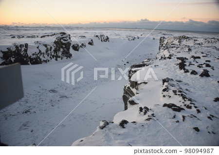Iceland, Reykjanes Peninsula, Europe and North America at dawn in winter Iceland, Reykjanes Peninsula, Europe and North America at dawn in winter 98094987