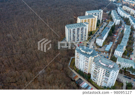 Aerial view of urban environment, city taking place of nature 98095127