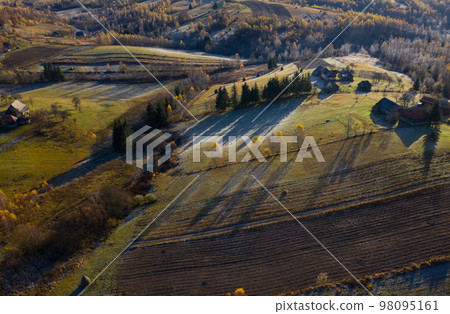 Aerial view of autumn mountain countryside farm 98095161