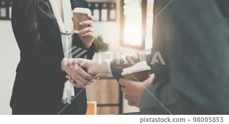 Business people handshake with business partners. Successful business concept. shaking hand after deal concept Business people handshake with business partners. Successful business concept. shaking hand after deal concept 98095853