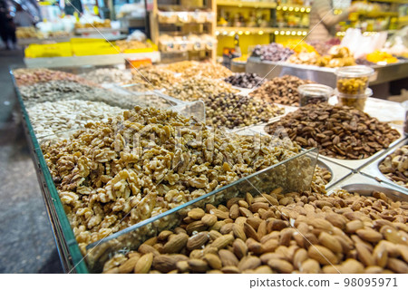 Nuts, almond, walnut in the market Nuts, almond, walnut in the market 98095971