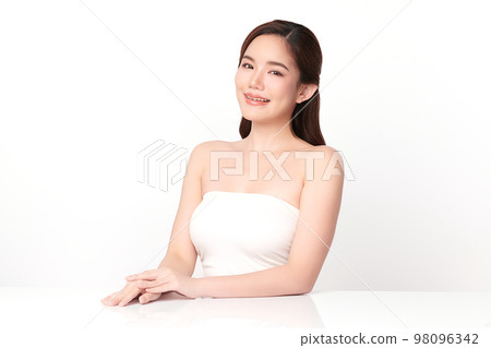 Beautiful young asian woman with clean fresh skin on white background, Face care, Facial treatment, Cosmetology, beauty and spa, Asian women portrait. Beautiful young asian woman with clean fresh skin on white background, Face care, Facial treatment, Cosmetology, beauty and spa, Asian women portrait. 98096342