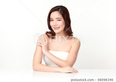 Beautiful young asian woman with clean fresh skin on white background, Face care, Facial treatment, Cosmetology, beauty and spa, Asian women portrait. Beautiful young asian woman with clean fresh skin on white background, Face care, Facial treatment, Cosmetology, beauty and spa, Asian women portrait. 98096346