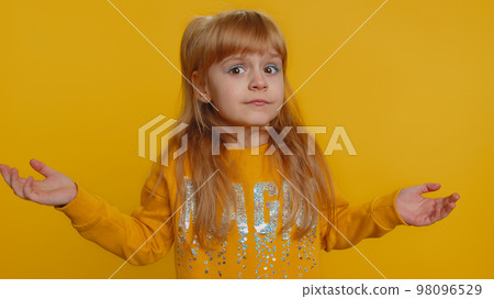 Frustrated young school girl kid covering ears ignoring unpleasant noise loud voices avoiding advice 98096529