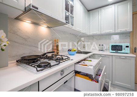 White and grey new modern well designed kitchen interior 98097258