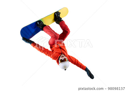Tricks. Portrait of active man, snowboarder in uniform riding on snowboard isolated over white studio background. Concept of winter sport, action, motion 98098137